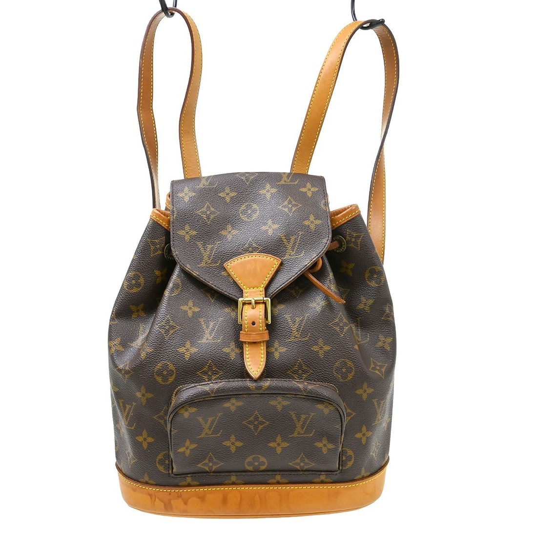 Louis Vuitton Montsouris MM monogram canvas backpack: Louis Vuitton Montsouris MM monogram canvas backpack This is a Louis Vuitton Montsouris MM backpack in the classic Monogram Canvas Leather. The bag features a flap buckle and drawstring closure, adjus