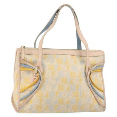 FENDI Zucchino Canvas Multicolor Gold Handbag Italy 11.8 x 7.5 x 4.7: FENDI Zucchino Canvas Multicolor Gold Handbag Italy 11.8 x 7.5 x 4.7 This FENDI Zucchino Canvas Hand Bag features a multicolor and gold design crafted from canvas. The bag includes a top handle and of