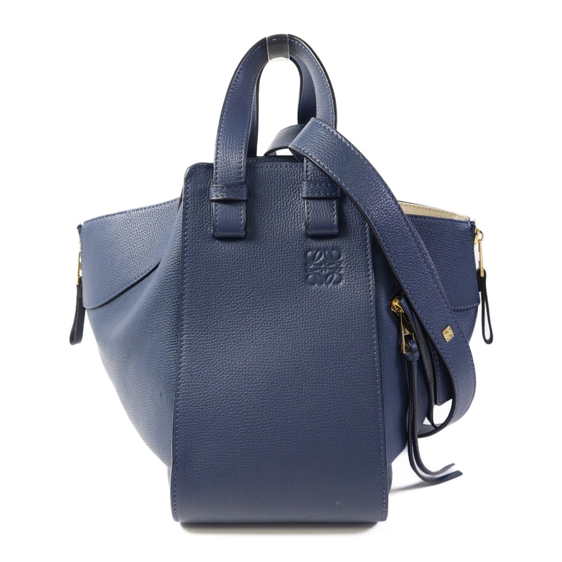 LOEWE Hammock Compact Navy Calfskin 2way Shoulder Bag GHW: LOEWE Hammock Compact Navy Calfskin 2way Shoulder Bag GHW This LOEWE compact Hammock 2-way shoulder bag features a sleek navy color and is crafted from high-quality calfskin leather. Designed for vers