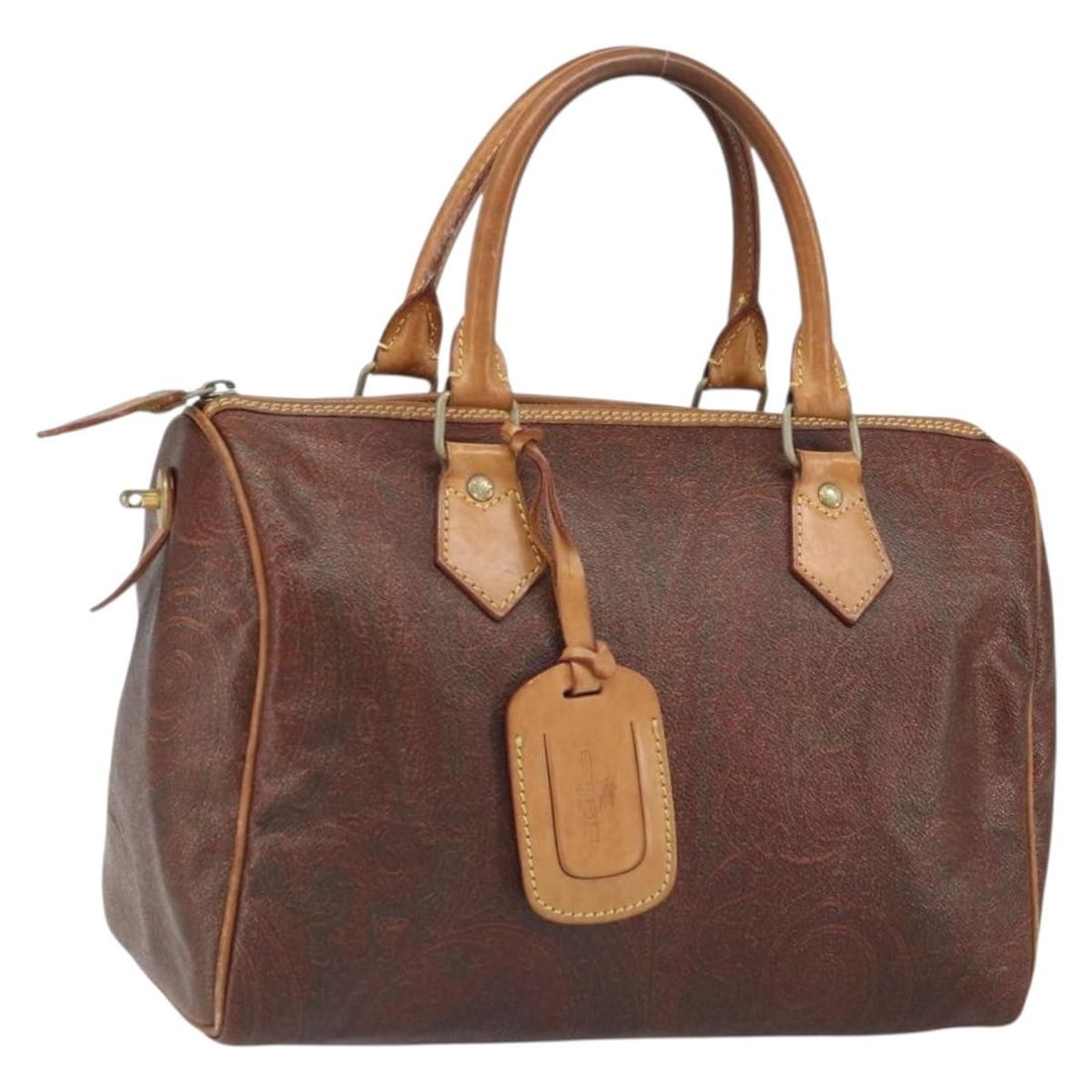 Etro Brown PVC Boston Bag with Gold Accents and Name Tag: Etro Brown PVC Boston Bag with Gold Accents and Name Tag This ETRO Boston bag features a classic paisley design crafted from PVC leather in brown and gold tones. The bag is designed with a spacious ma