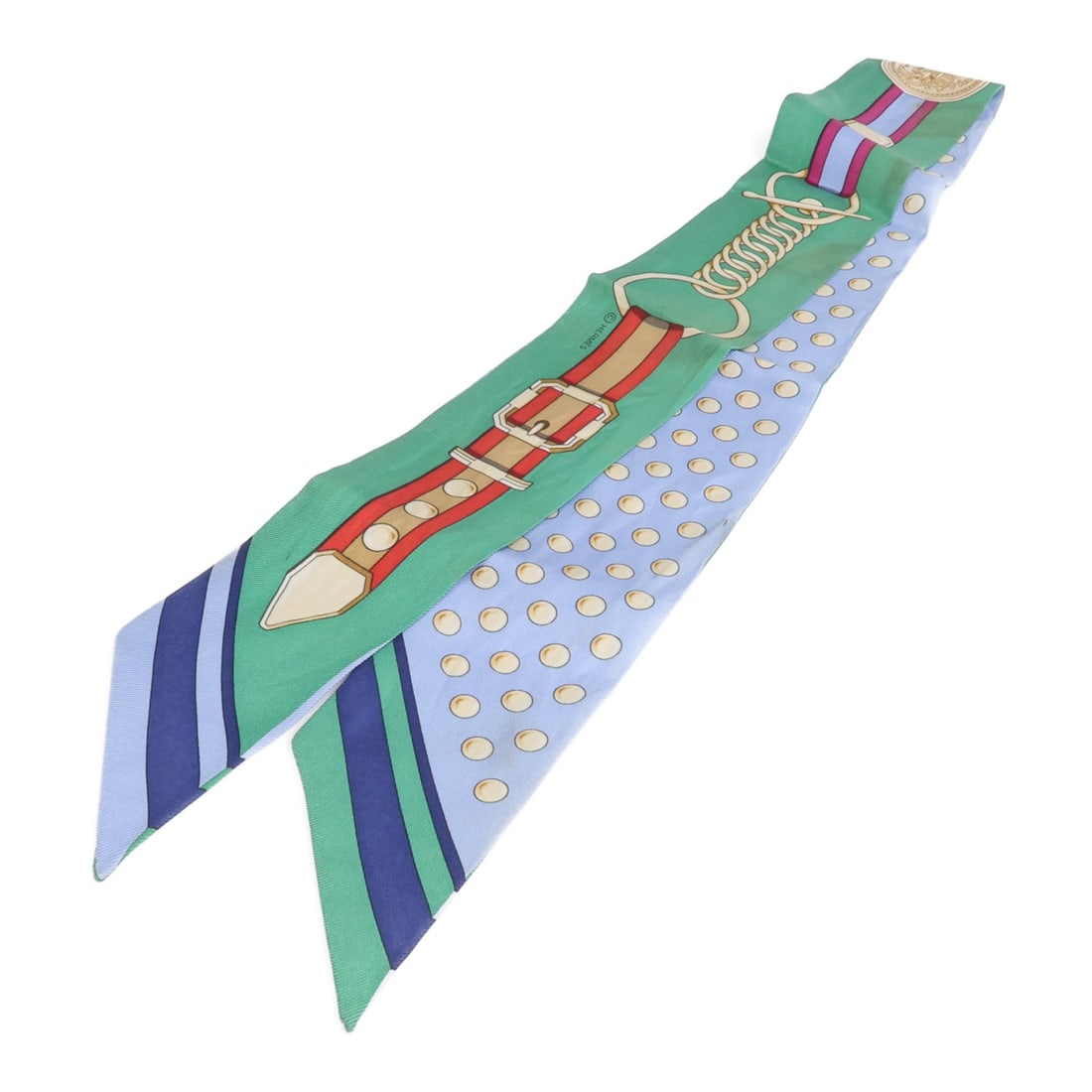 Hermes silk blue green twilly scarf: Hermes silk blue green twilly scarf This Hermes Twilly scarf is crafted from luxurious silk and features a blue and green color palette. Designed for women, it is a regular size and made in France. Th