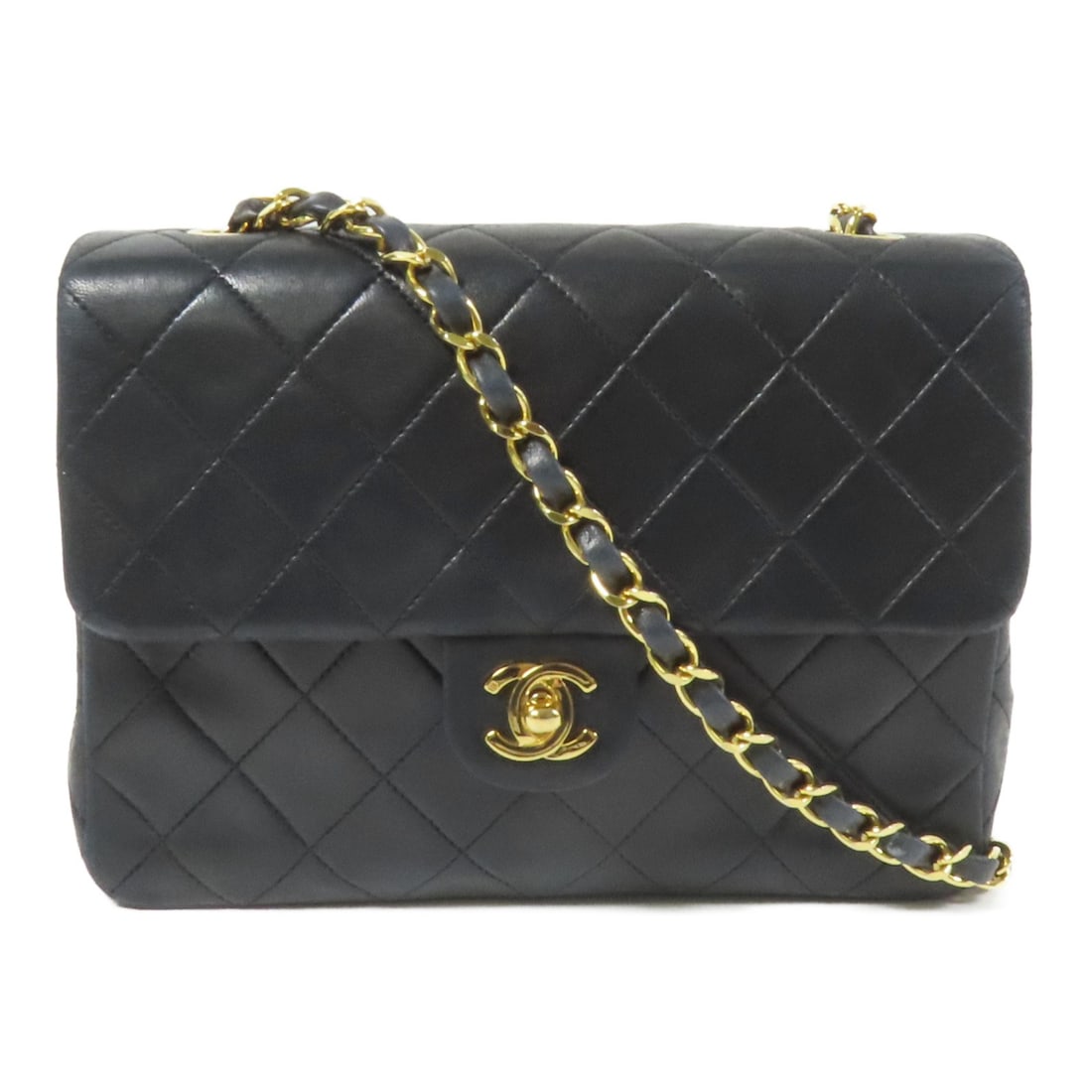 CHANEL Mini Classic 20 black lambskin shoulder bag GHW: CHANEL Mini Classic 20 black lambskin shoulder bag GHW This CHANEL Mini Classic 20 chain shoulder bag features a black lambskin (sheep leather) exterior and gold-tone hardware. Designed for women, it 