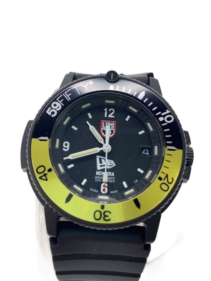 Luminox x New Era Black Quartz Men's Wristwatch: Luminox x New Era Black Quartz Men's Wristwatch This LUMINOX men's wristwatch features a quartz movement and a sleek black design. Sourced and made in Switzerland, it is crafted with attention to deta