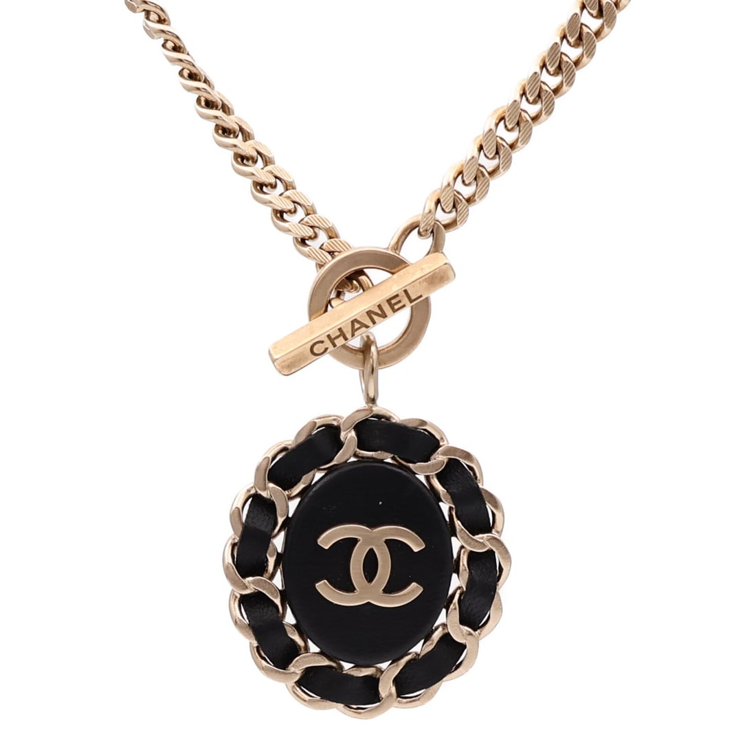 Black and Gold Metal CC Pendant Necklace by CHANEL: Black and Gold Metal CC Pendant Necklace by CHANEL This CHANEL necklace features the iconic CC logo in a striking black and gold color combination. Crafted from mixed materials, it showcases a