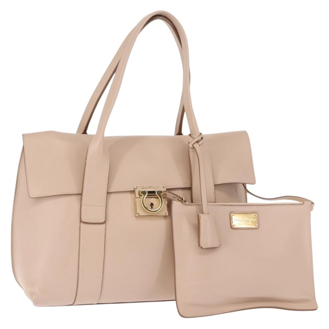 Salvatore Ferragamo Gancini Pink Leather Shoulder Bag with Pouch: Salvatore Ferragamo Gancini Pink Leather Shoulder Bag with Pouch This Salvatore Ferragamo Gancini shoulder bag features a stylish pink and gold leather exterior, complemented by gold-tone metal fittin
