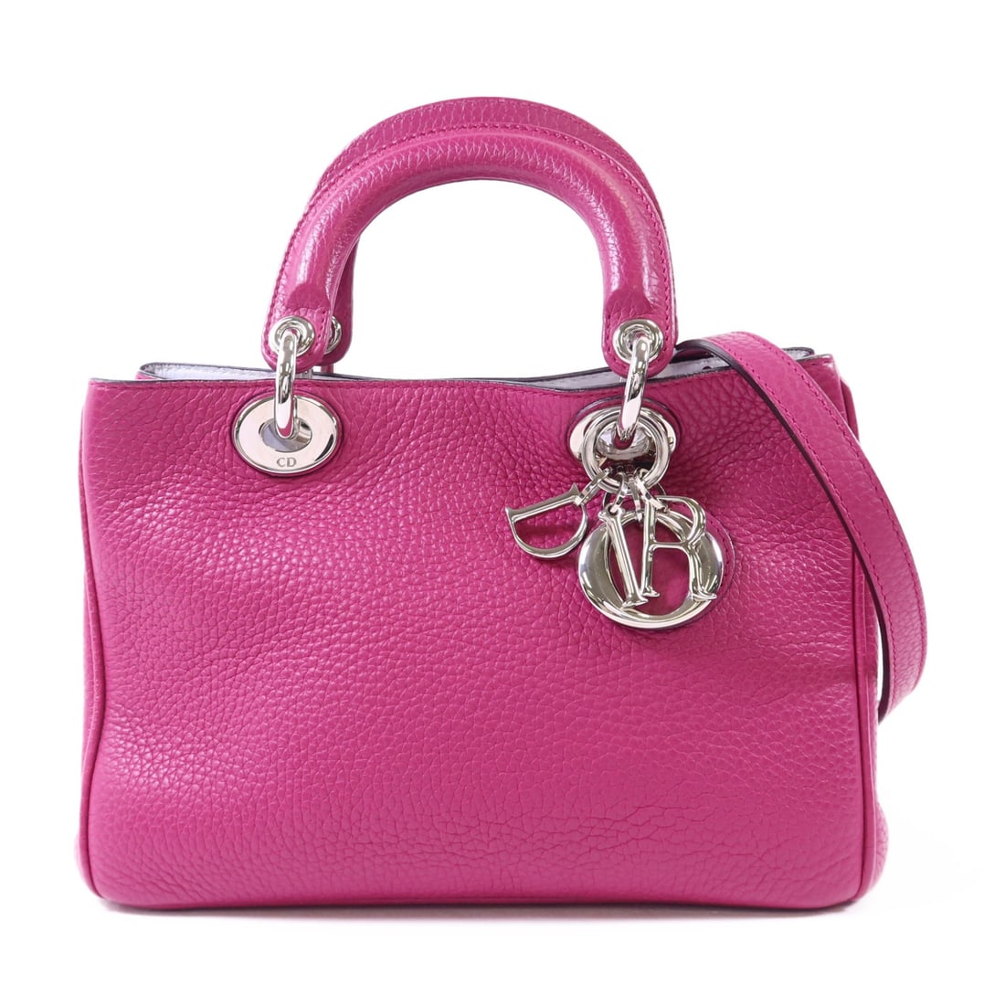 Dior Diorissimo Magenta Calfskin 2 Way Shoulder Bag with Silver Hardware: Dior Diorissimo Magenta Calfskin 2 Way Shoulder Bag with Silver Hardware This Christian Dior Diorissimo 2-way shoulder bag is crafted from magenta calfskin leather and features silver-tone hardware. M