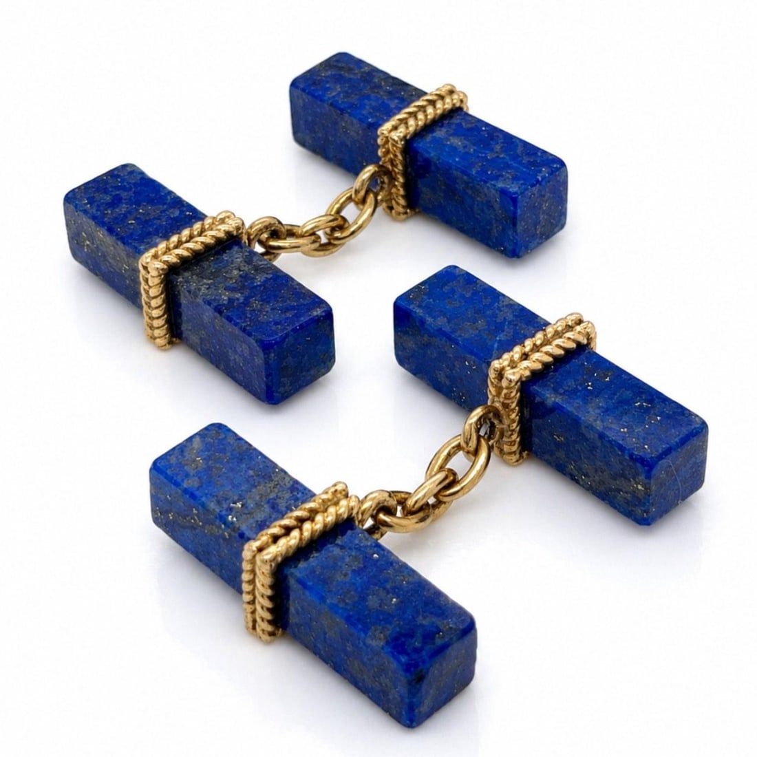 Lapis Lazuli Cufflinks in 18K Yellow Gold French Hallmark: Lapis Lazuli Cufflinks in 18K Yellow Gold French Hallmark These French cufflinks are crafted from 18K yellow gold and feature striking lapis lazuli accents. Weighing 8.9 grams, they are marked with a 