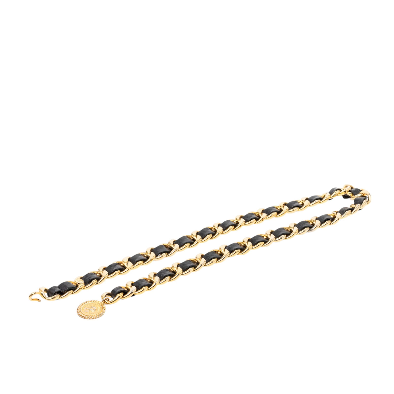 Chanel gold tone woven chain medallion belt: Chanel gold tone woven chain medallion belt This Chanel CC Gold Plated Leather Woven Medallion Chain Belt features a gold-tone chain link design intricately woven with leather and adorned with a medal