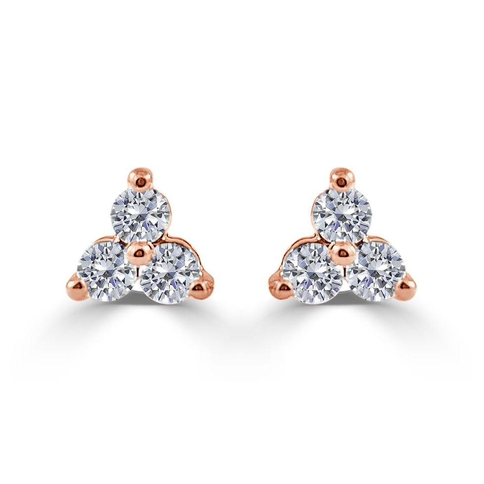 Rose Gold Diamond Trio Stud Earrings 14k 1/4 Ctw: Rose Gold Diamond Trio Stud Earrings 14k 1/4 Ctw These elegant stud earrings are crafted from 14k rose gold and feature a trio design set with a total of six round white diamonds. With a combined diam
