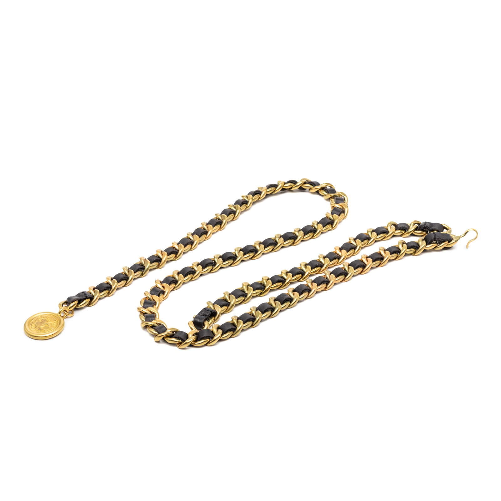 Chanel woven chain leather medallion belt gold plated CC: Chanel woven chain leather medallion belt gold plated CC This Chanel belt features a distinctive leather-woven gold-tone chain link design with a medallion charm and a hook closure. Crafted from metal