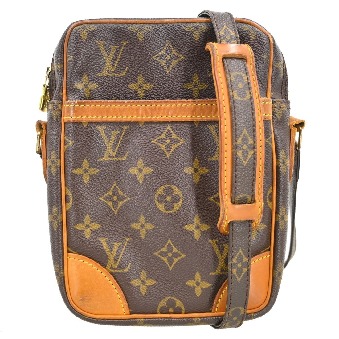 Louis Vuitton Danube Monogram Crossbody Bag: Louis Vuitton Danube Monogram Crossbody Bag This Louis Vuitton Danube crossbody shoulder bag features the iconic monogram canvas leather with brown leather accents. Designed for casual occasions, it o