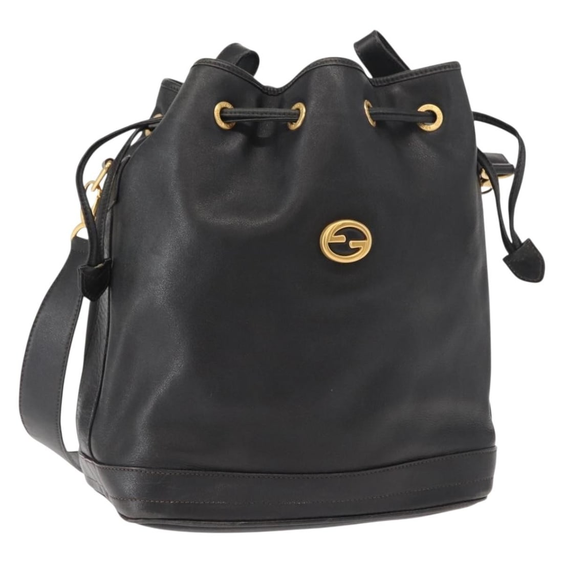 Black Leather Gucci Vintage Drawstring Shoulder Purse Italy: Black Leather Gucci Vintage Drawstring Shoulder Purse Italy This Gucci vintage drawstring shoulder bag is crafted from black leather and features a classic silhouette designed for women. Made in Italy