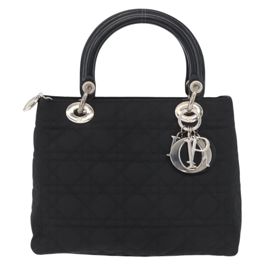 Christian Dior Lady Dior Nylon Tote Black 24cm x 18cm x 9cm: Christian Dior Lady Dior Nylon Tote Black 24cm x 18cm x 9cm This vintage Lady Dior bag features the iconic Cannage quilt design in black nylon. Made in Italy, the bag is designed for women and showcas