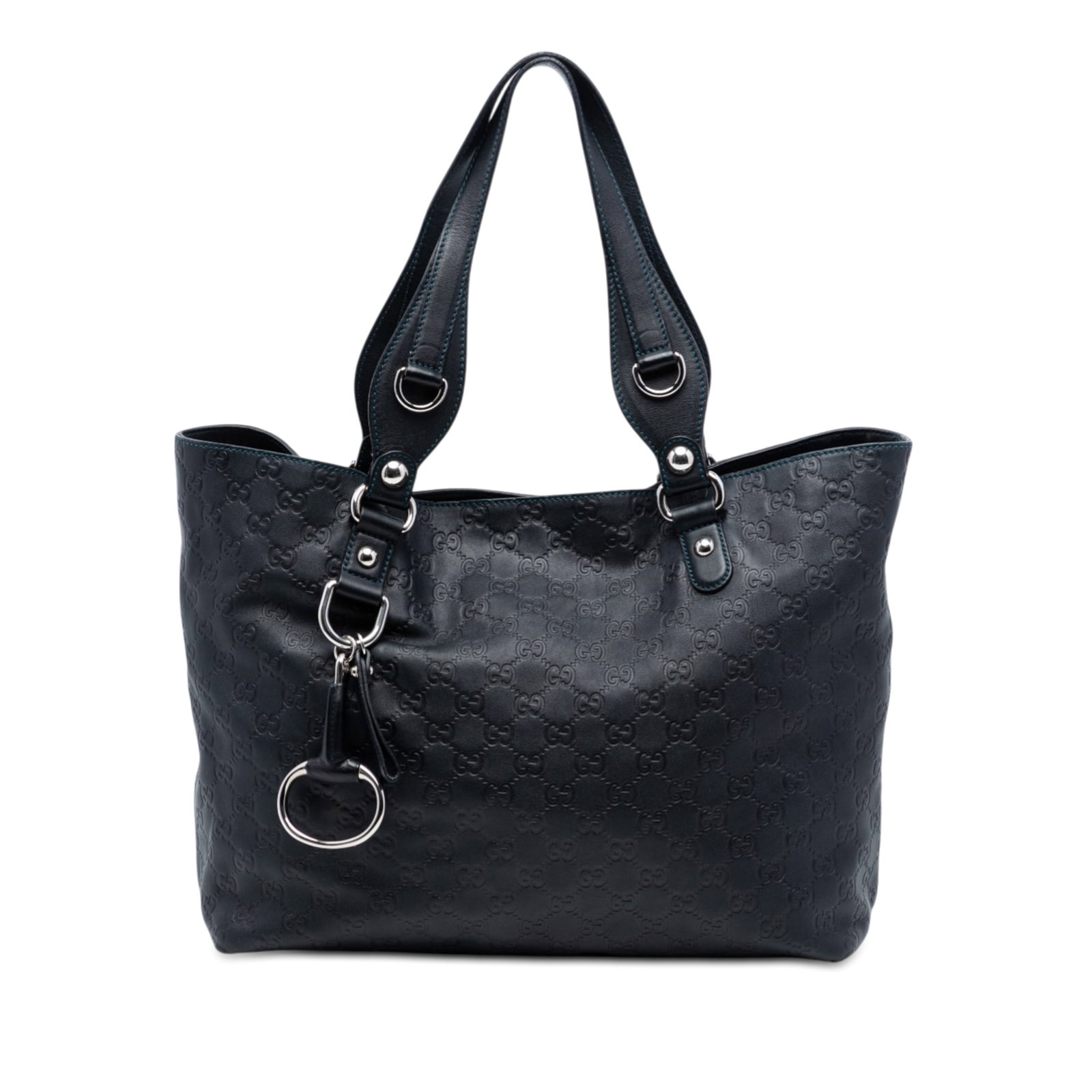 Gucci Guccissima leather tote with magnetic snap closure: Gucci Guccissima leather tote with magnetic snap closure This Gucci Medium Guccissima Icon Bit Tote is crafted from blue leather and features flat leather handles, an open top with a magnetic snap
