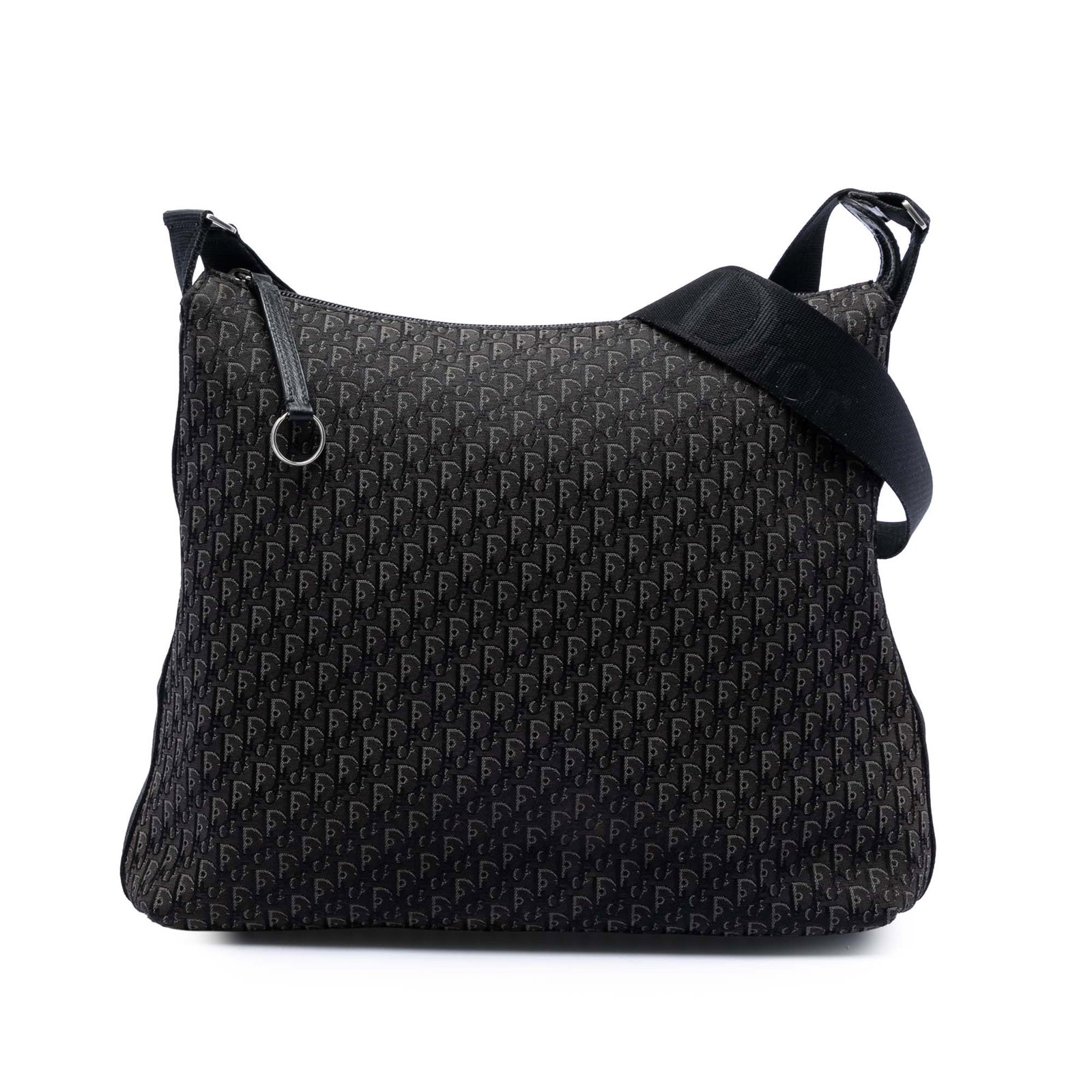 Dior black canvas Trotter crossbody bag: Dior black canvas Trotter crossbody bag This Diorissimo Trotter Canvas Crossbody bag features a durable fabric body in black with an adjustable flat shoulder strap for comfortable wear. The bag is