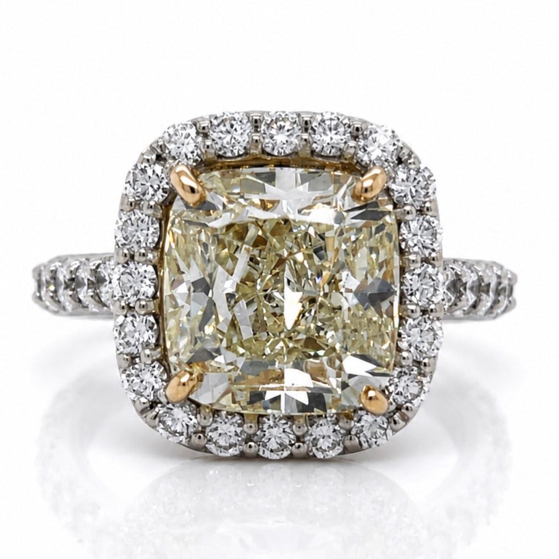 GIA Certified Cushion Cut Diamond Ring 18K White Gold Size 6.75: GIA Certified Cushion Cut Diamond Ring 18K White Gold Size 6.75 This elegant ring is crafted from 18K white gold and features a stunning 5.03 carat cushion-cut diamond that is GIA certified. The cente