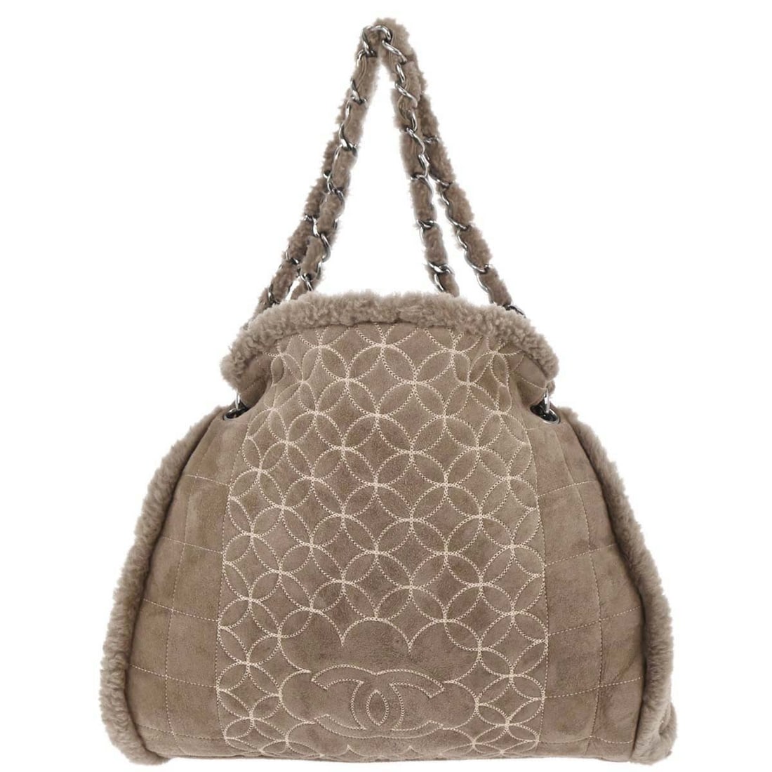 Chanel Vintage Embroidered CC Tote in Brown Suede: Chanel Vintage Embroidered CC Tote in Brown Suede This Chanel Vintage Embroidered CC Chain Tote is crafted from quilted brown suede and features shearling accents. The bag showcases the iconic embroid