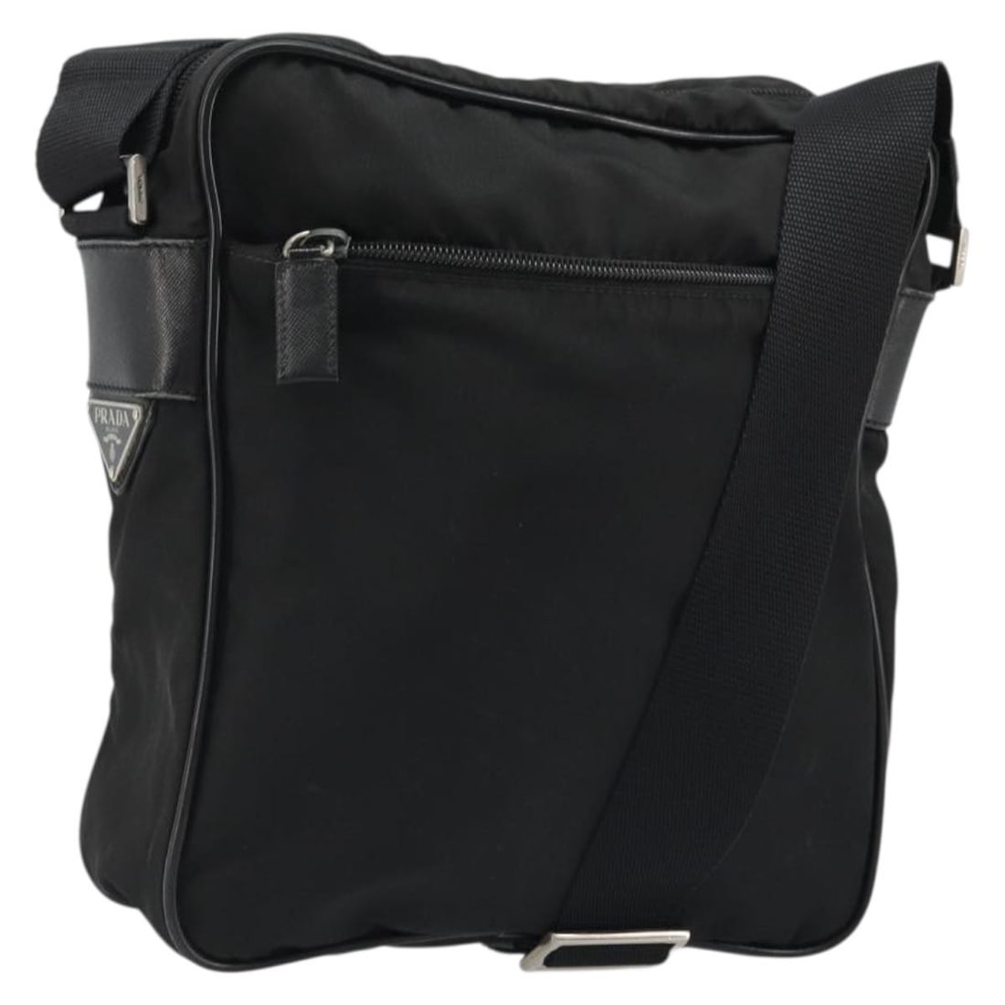 Prada Black Nylon Silver Tone Shoulder Bag Italy: Prada Black Nylon Silver Tone Shoulder Bag Italy This PRADA shoulder bag is crafted from black nylon with silver-tone accents. Designed for women, it features an adjustable strap and a compact silhoue
