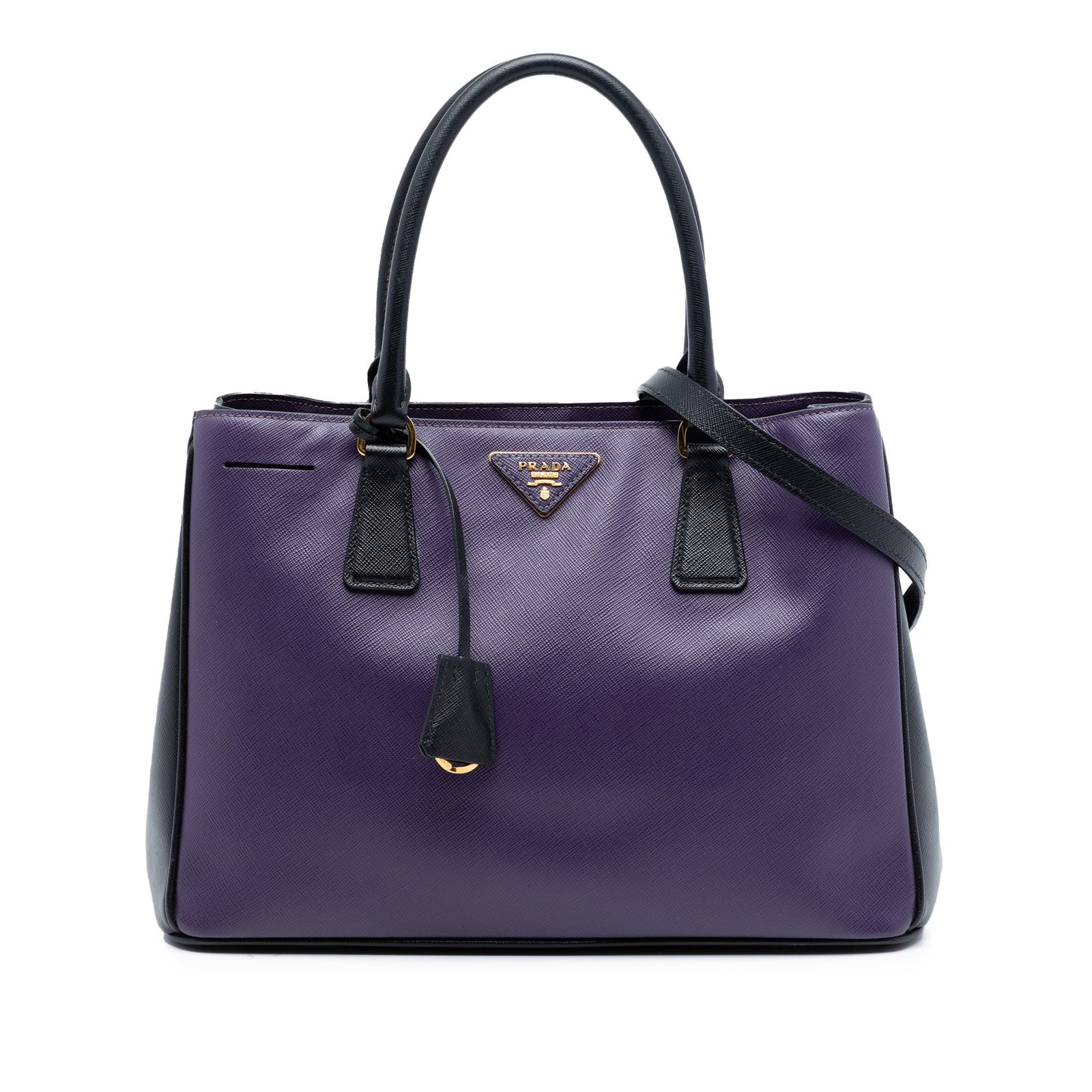 Prada Galleria Purple Saffiano Leather Satchel Medium Bicolor: Prada Galleria Purple Saffiano Leather Satchel Medium Bicolor This Prada Medium Bicolor Saffiano Lux Galleria Satchel is crafted from saffiano leather and features rolled leather handles, an adjustabl