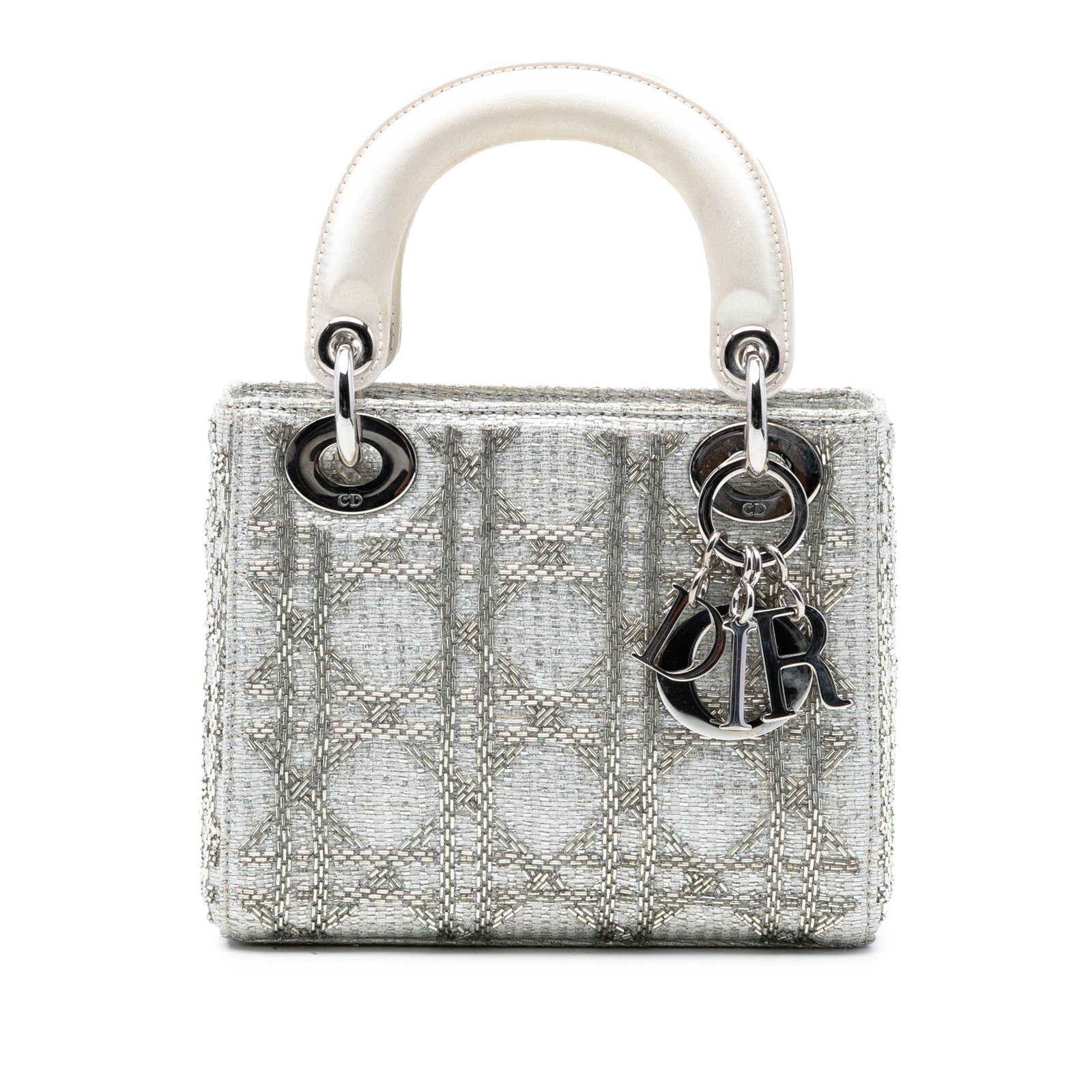 Dior Mini Tweed Cannage Beaded Lady Handbag: Dior Mini Tweed Cannage Beaded Lady Handbag This Mini Tweed Cannage Beaded Lady Dior bag features a beaded tweed fabric body, flat top handles, a fold-in flap closure, and an interior zip pocket. The 