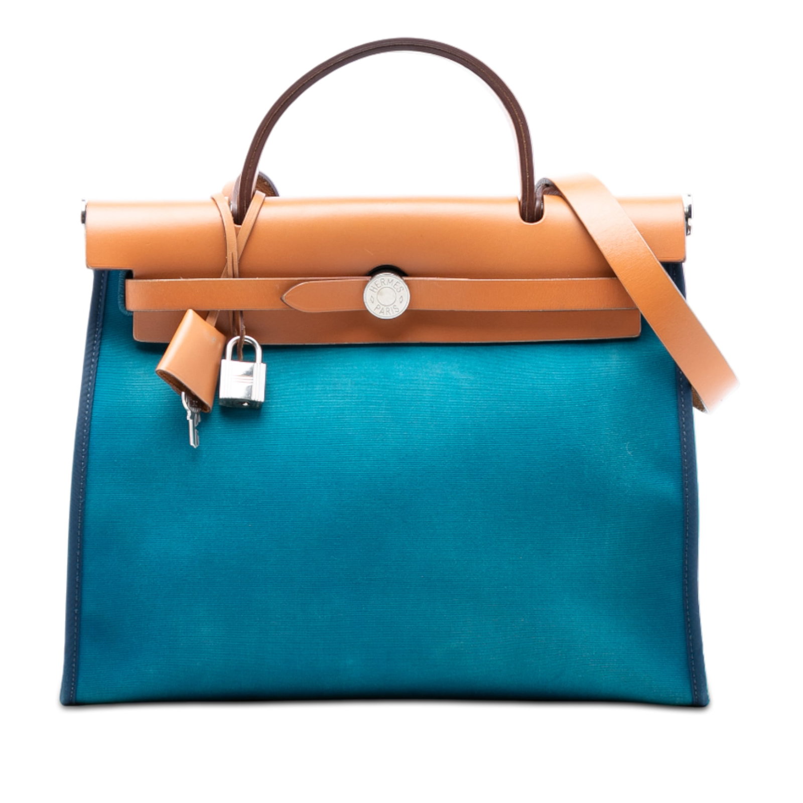 Blue Canvas Herbag Zip 31 Shoulder Bag with Leather Trim by Hermes: Blue Canvas Herbag Zip 31 Shoulder Bag with Leather Trim by Hermes The Hermes Toile Herbag Zip 31 is crafted with a blue canvas body complemented by leather trim. It features a flat leather top handle
