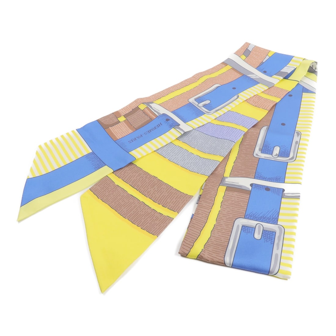 HERMES Silk Maxi Twilly Yellow Brown Scarf: HERMES Silk Maxi Twilly Yellow Brown Scarf This HERMES Maxi Twilly scarf is crafted from luxurious silk in a vibrant yellow and brown colorway. Designed for women, it offers a versatile accessory