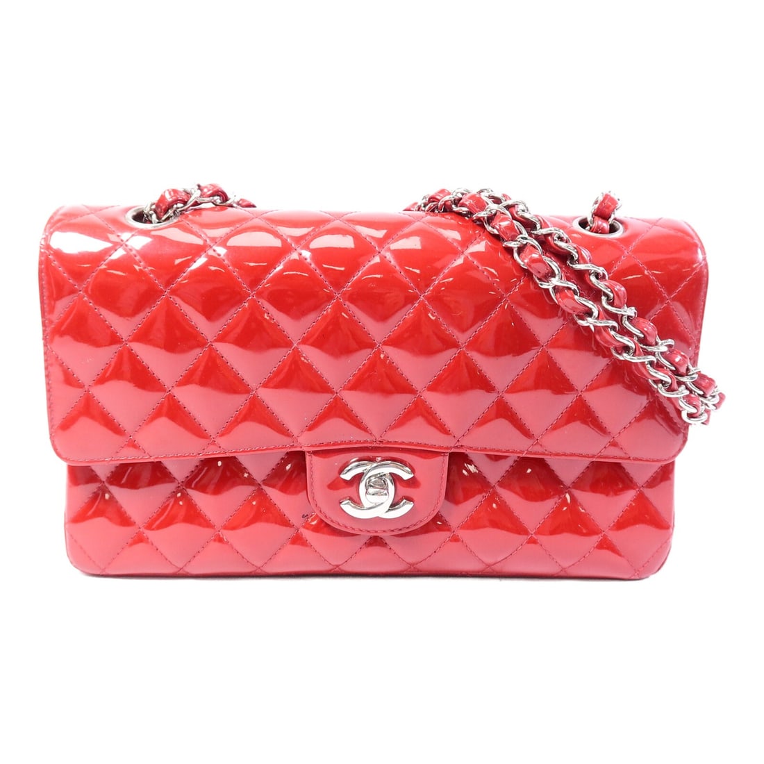 CHANEL Red Patent Leather CC Shoulder Bag SHW: CHANEL Red Patent Leather CC Shoulder Bag SHW This CHANEL shoulder bag features a striking red patent leather exterior, complemented by a classic chain design. Designed for women, it offers both
