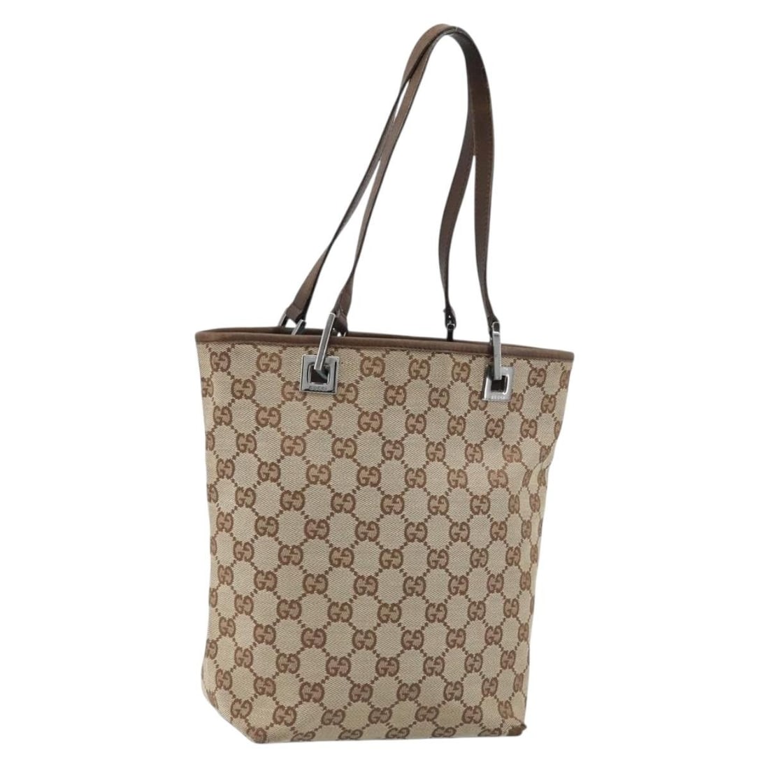 Gucci Beige Silver GG Canvas Tote 31244 Italy Women: Gucci Beige Silver GG Canvas Tote 31244 Italy Women This is a Gucci GG Canvas tote bag in beige and silver, featuring the signature GG canvas exterior. The bag is designed for women and offers a spaci