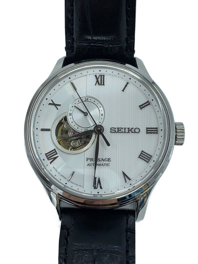 Seiko Presage Men's Open Heart Skeleton Watch 4R39-00W0: Seiko Presage Men's Open Heart Skeleton Watch 4R39-00W0 This SEIKO PRESAGE Open Heart Skeleton 4R39-00W0 is a men's wristwatch featuring an open-heart skeleton design. Crafted in Japan, it is in sligh
