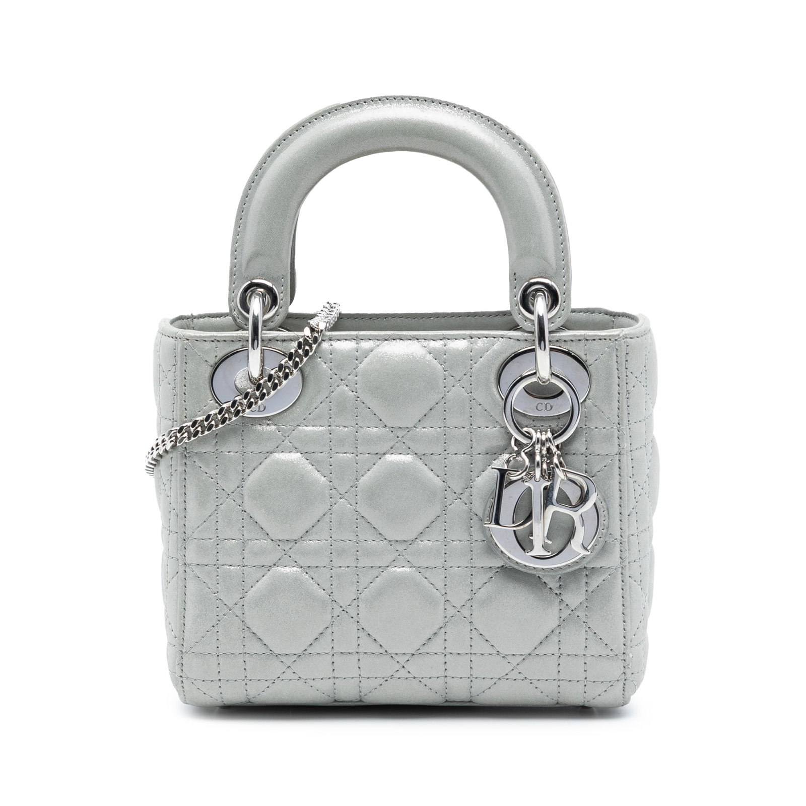 Dior Lady Dior Mini Iridescent Lambskin Cannage Silver Bag with Chain Strap: Dior Lady Dior Mini Iridescent Lambskin Cannage Silver Bag with Chain Strap This Lady Dior bag features an iridescent quilted lambskin leather body in silver, complemented by flat leather top handles 