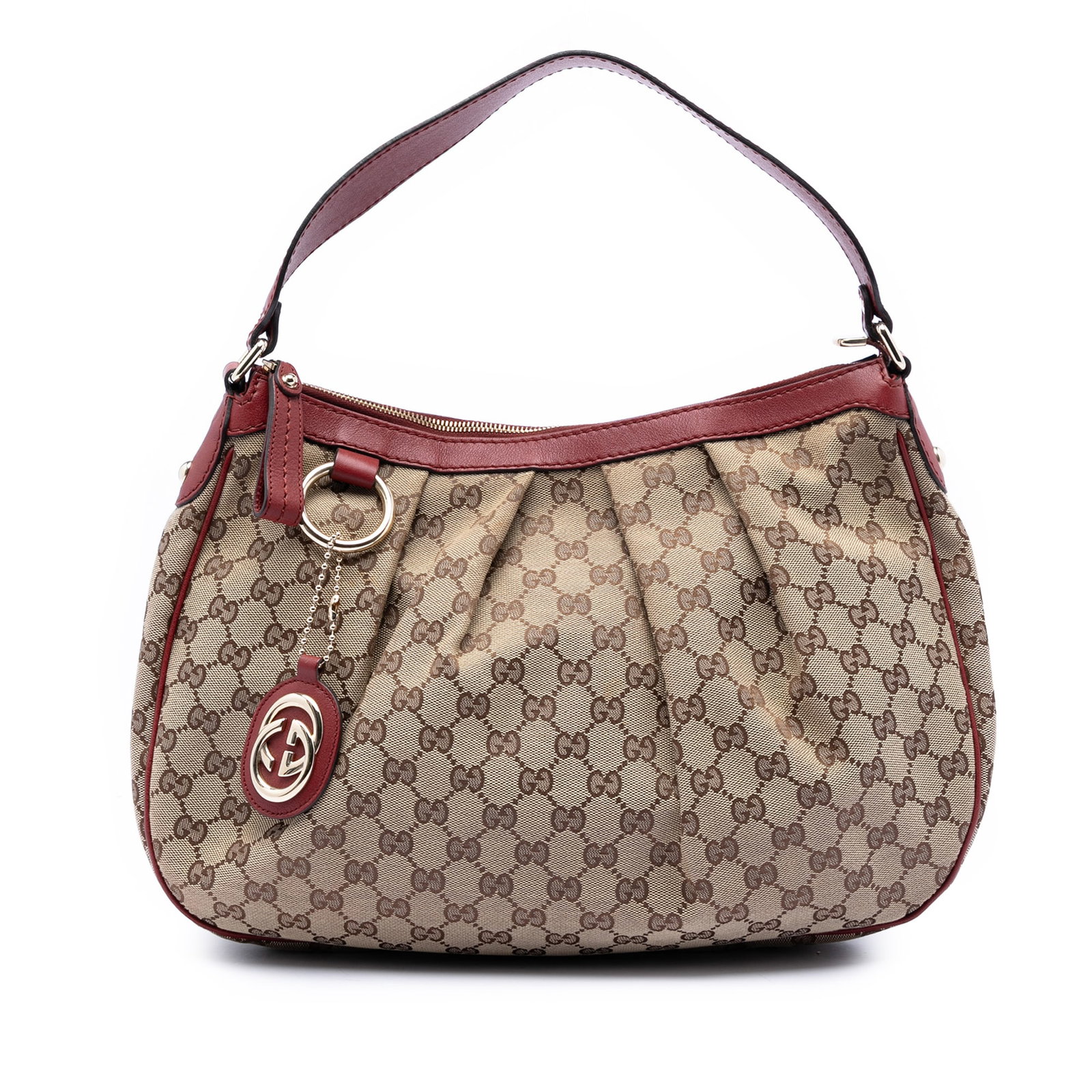 Gucci Sukey GG canvas tote bag beige leather trim: Gucci Sukey GG canvas tote bag beige leather trim This Gucci GG Canvas Sukey Shoulder Bag features a beige canvas body with leather trim, a flat leather strap, a top zip closure, and interior zip and 