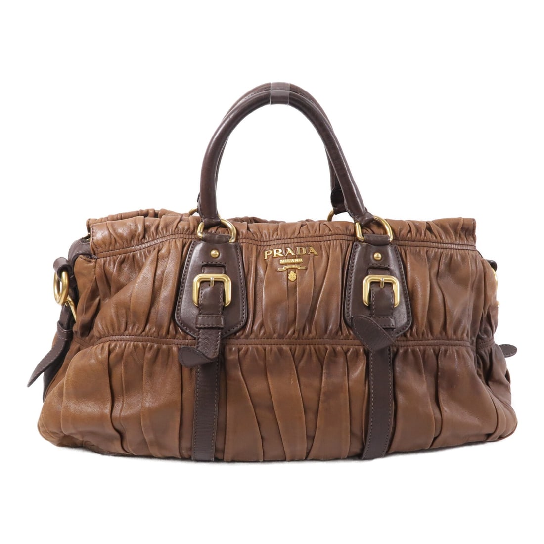 Prada BN1336 Brown Calfskin Leather Tote Bag GHW: Prada BN1336 Brown Calfskin Leather Tote Bag GHW This PRADA tote bag features a classic and sophisticated design crafted from high-quality calfskin leather in black. Designed for women, it offers ampl
