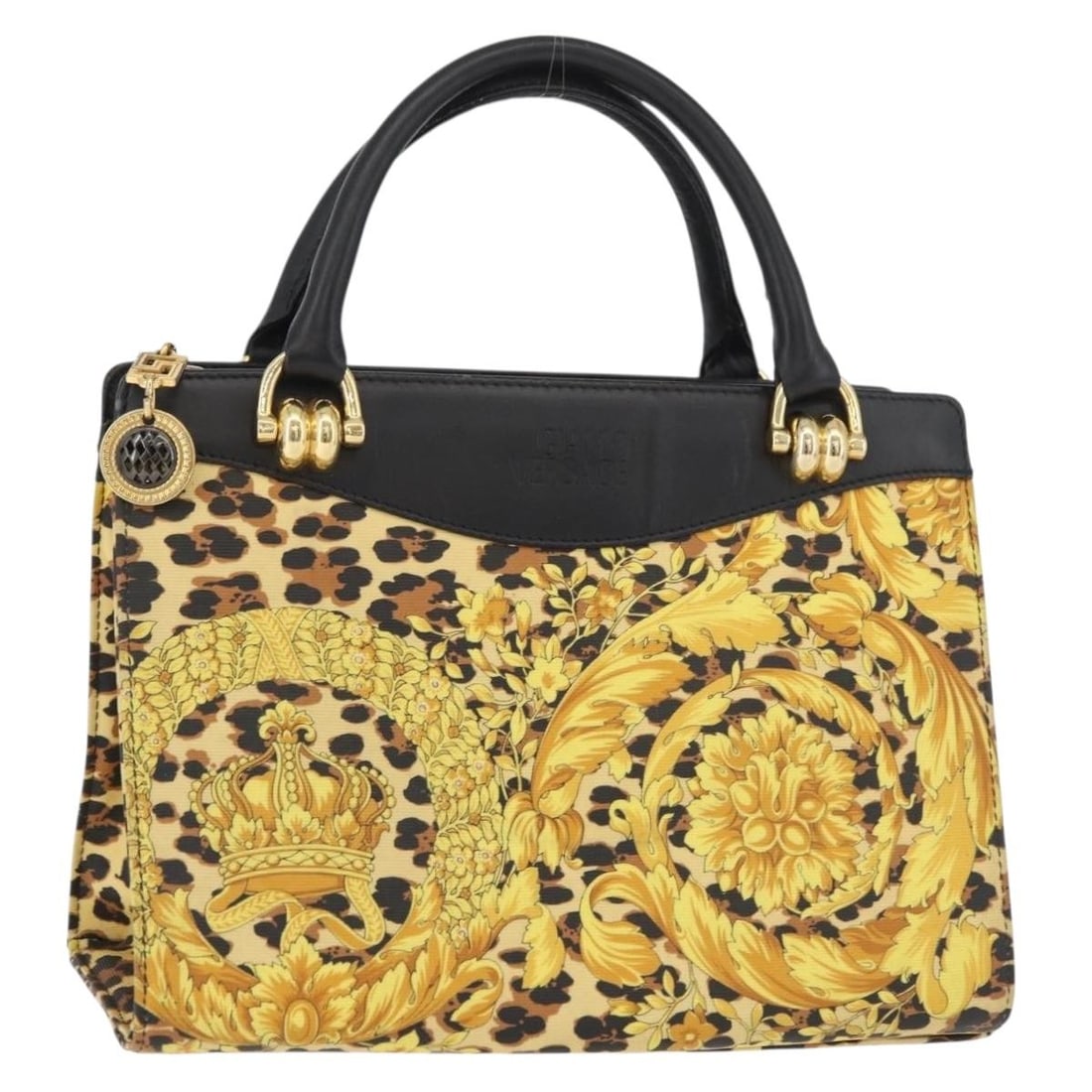 Versace yellow gold PVC leather handbag Italy: Versace yellow gold PVC leather handbag Italy This Versace handbag is crafted from PVC leather in a striking yellow and gold color combination. Designed for women, it features a structured silhouette 