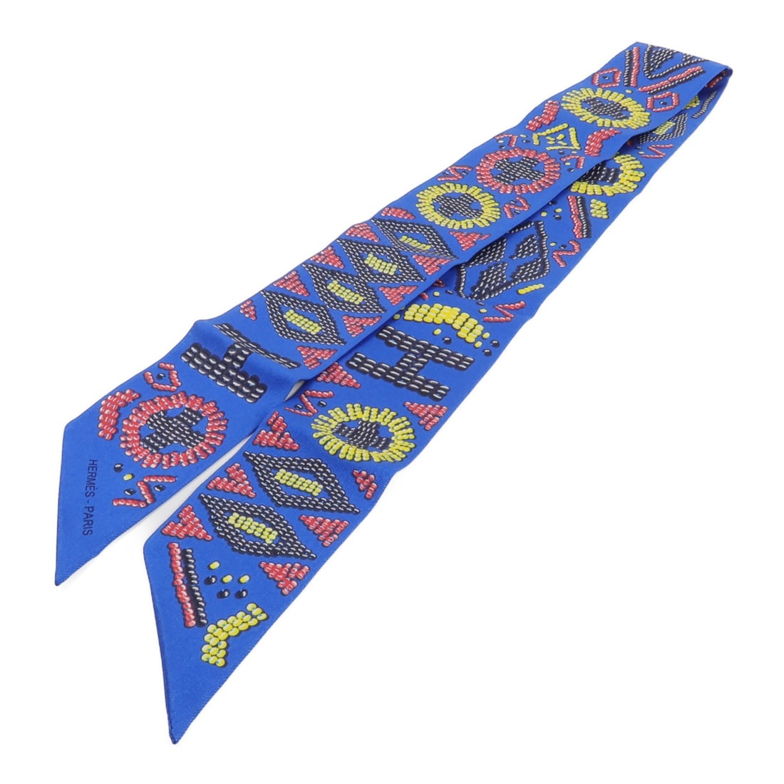 Hermes Twilly Blue Silk Women Scarf: Hermes Twilly Blue Silk Women Scarf This Hermes Twilly scarf is crafted from luxurious silk in a striking blue color. Designed for women, it features a classic scarf style and is made in France, refle