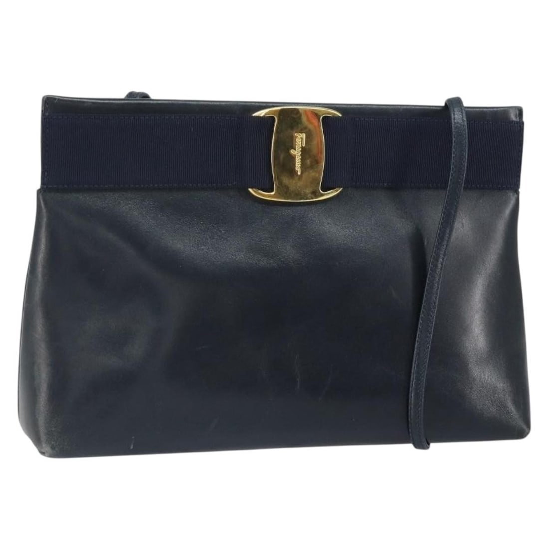 Leather Navy and Gold Salvatore Ferragamo Shoulder Bag Made in Italy: Leather Navy and Gold Salvatore Ferragamo Shoulder Bag Made in Italy This Salvatore Ferragamo shoulder bag features navy leather with gold-tone hardware. Crafted in Italy, it offers dimensions of
