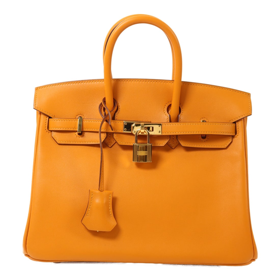Hermes Birkin 25 Apricot Calfskin Handbag with Gold Hardware: Hermes Birkin 25 Apricot Calfskin Handbag with Gold Hardware This Hermes Birkin 25 handbag is crafted from Veau Swift calfskin leather in an apricot orange color. Designed for women, it features gold 