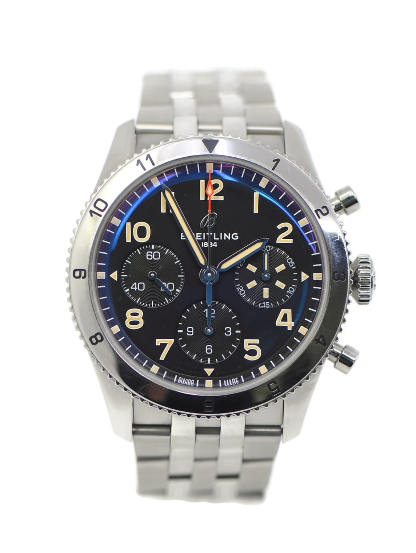 Breitling Avi P-51 Mustang A23380 Stainless Steel Watch with Box and Papers: Breitling Avi P-51 Mustang A23380 Stainless Steel Watch with Box and Papers The Breitling Avi P-51 Mustang is a striking stainless steel wristwatch, showcasing a bold black dial that offers a classic 