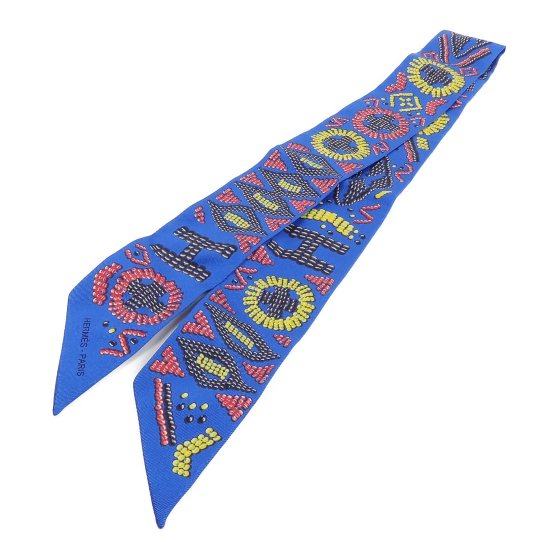 Hermes Twilly Blue Silk Scarf: Hermes Twilly Blue Silk Scarf This Hermes Twilly scarf is crafted from luxurious silk and features a sophisticated blue color. Designed for women, it showcases the brand's signature elegance and is ma