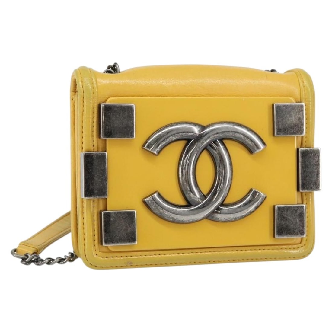 Yellow Chanel Boy Brick Flap Shoulder Bag in Lambskin and Plexiglass: Yellow Chanel Boy Brick Flap Shoulder Bag in Lambskin and Plexiglass The Chanel Boy Brick Flap Bag is crafted from lambskin leather and plexiglass in a striking yellow color. Designed for women, this 