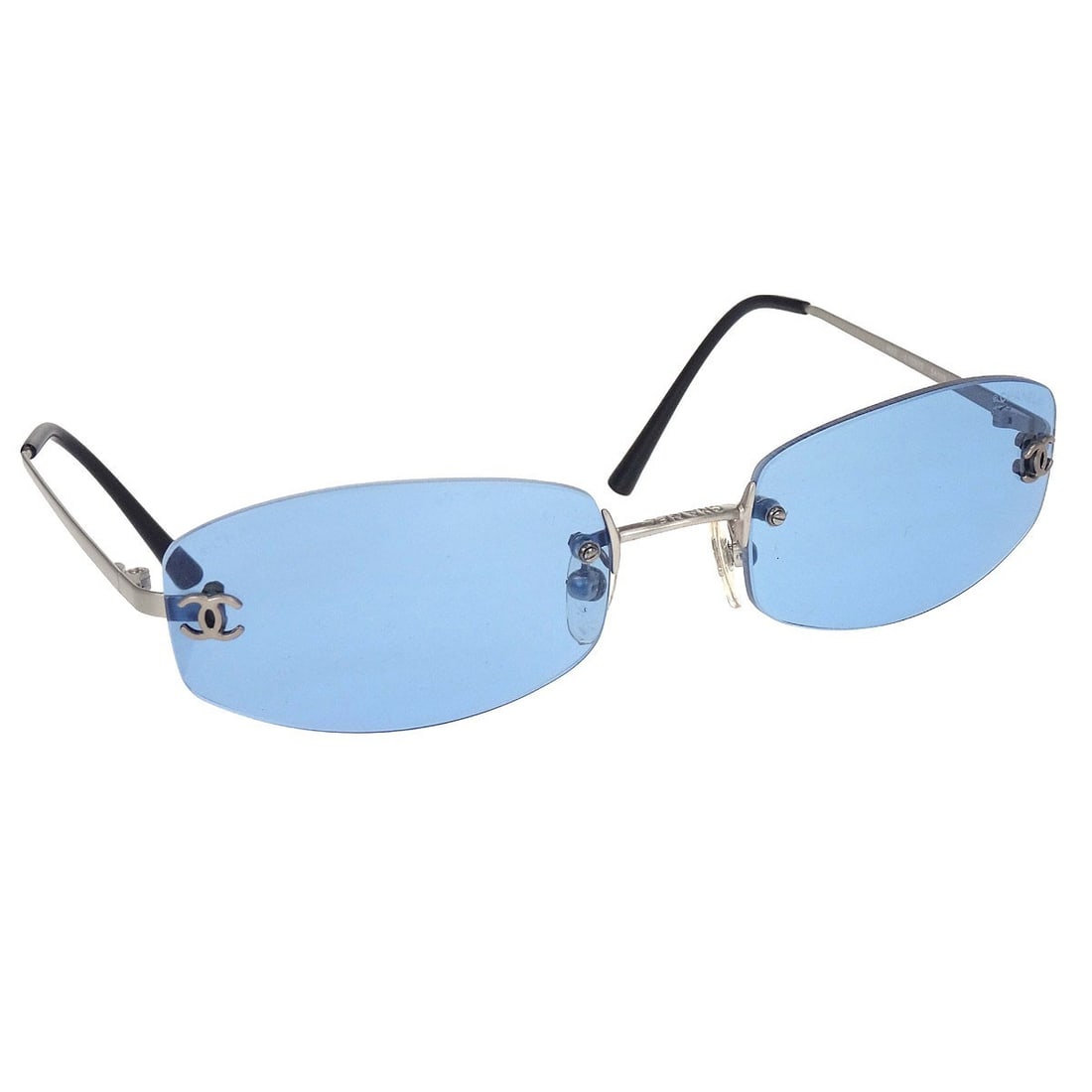 Chanel CC Logos Blue Lens Silver Frame Sunglasses: Chanel CC Logos Blue Lens Silver Frame Sunglasses These Chanel sunglasses feature a silver acrylic frame with blue acrylic lenses, offering a stylish and distinctive look. Designed for women, the sung