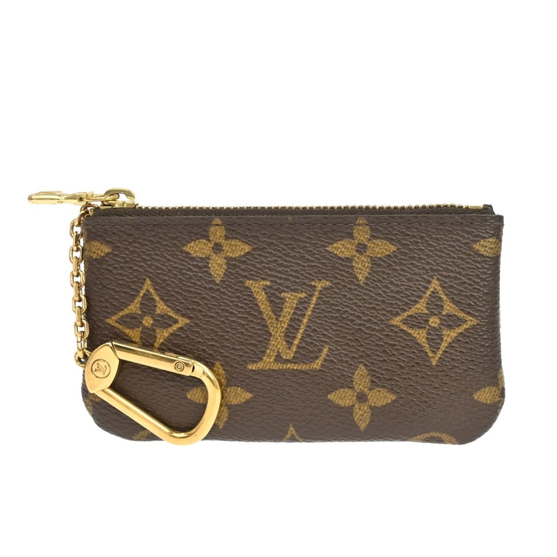 Louis Vuitton Monogram Coin Wallet Pochette Cles M62650: Louis Vuitton Monogram Coin Wallet Pochette Cles M62650 This Louis Vuitton Monogram Pochette Cles coin purse is crafted from brown leather and features the iconic monogram design. Designed for unisex 