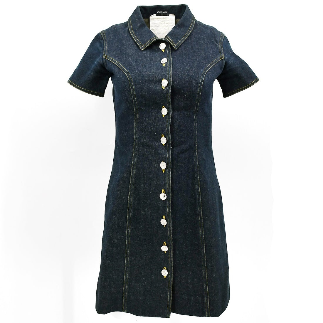 Chanel Vintage Navy Denim Dress Short Sleeve Collared 100% Cotton: Chanel Vintage Navy Denim Dress Short Sleeve Collared 100% Cotton This chic Chanel short sleeve denim dress in navy is perfect for casual outings. Crafted from 100% cotton denim, it features a classic