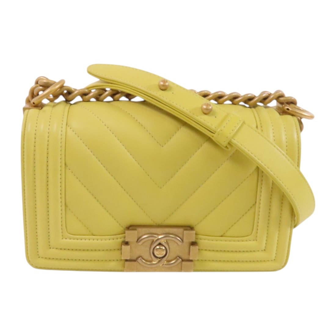 CHANEL Boy 20 Yellow Lambskin Chain Shoulder Bag: CHANEL Boy 20 Yellow Lambskin Chain Shoulder Bag This CHANEL Boy Chanel 20 shoulder bag features a vibrant yellow lambskin leather exterior and is designed with a classic chain strap. The bag is craft