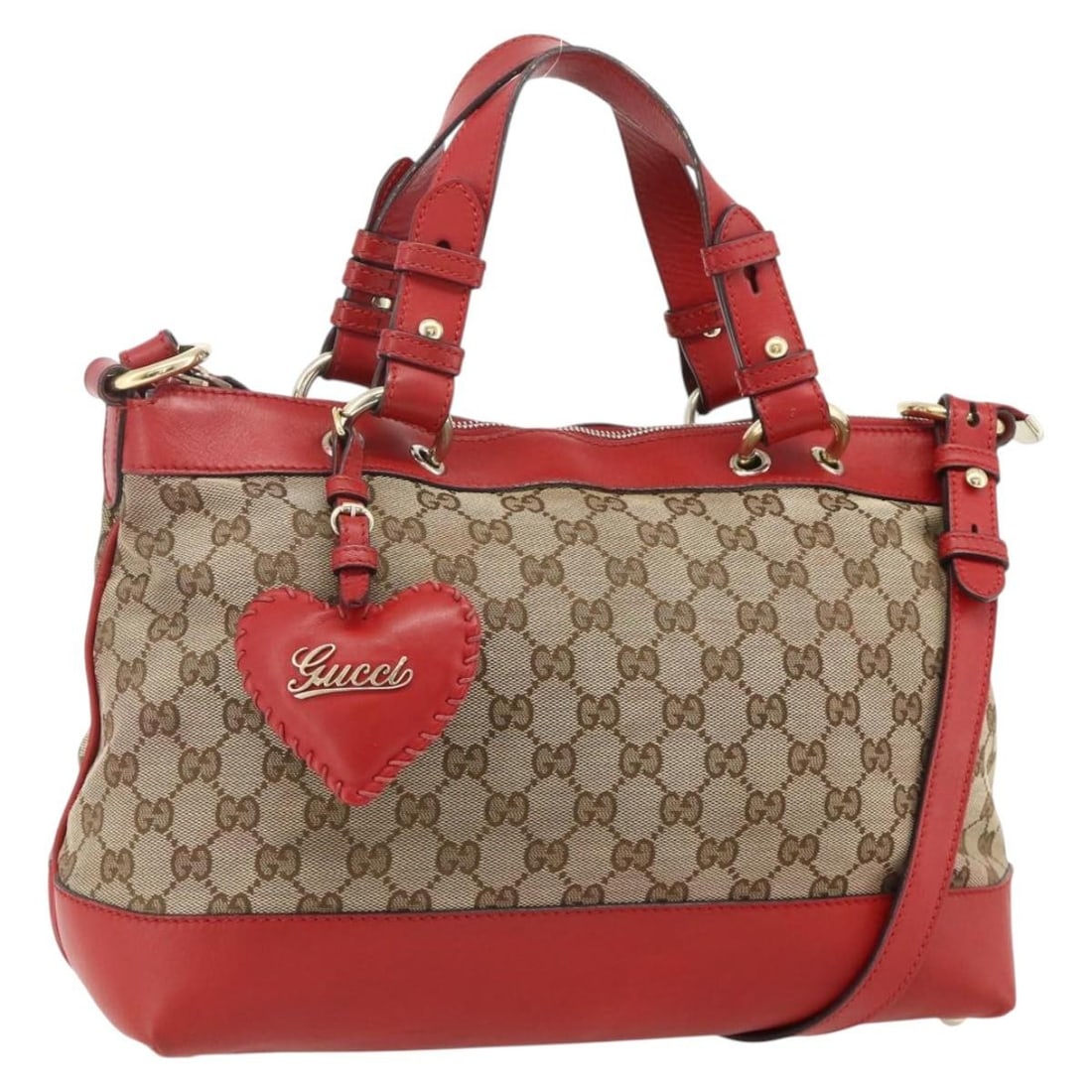 Gucci 309122 Beige Gold Leather GG Canvas Handbag Strap Charm: Gucci 309122 Beige Gold Leather GG Canvas Handbag Strap Charm This GUCCI GG Canvas 2-way handbag features a combination of beige and gold tones, crafted from leather and GG canvas. Designed for versat