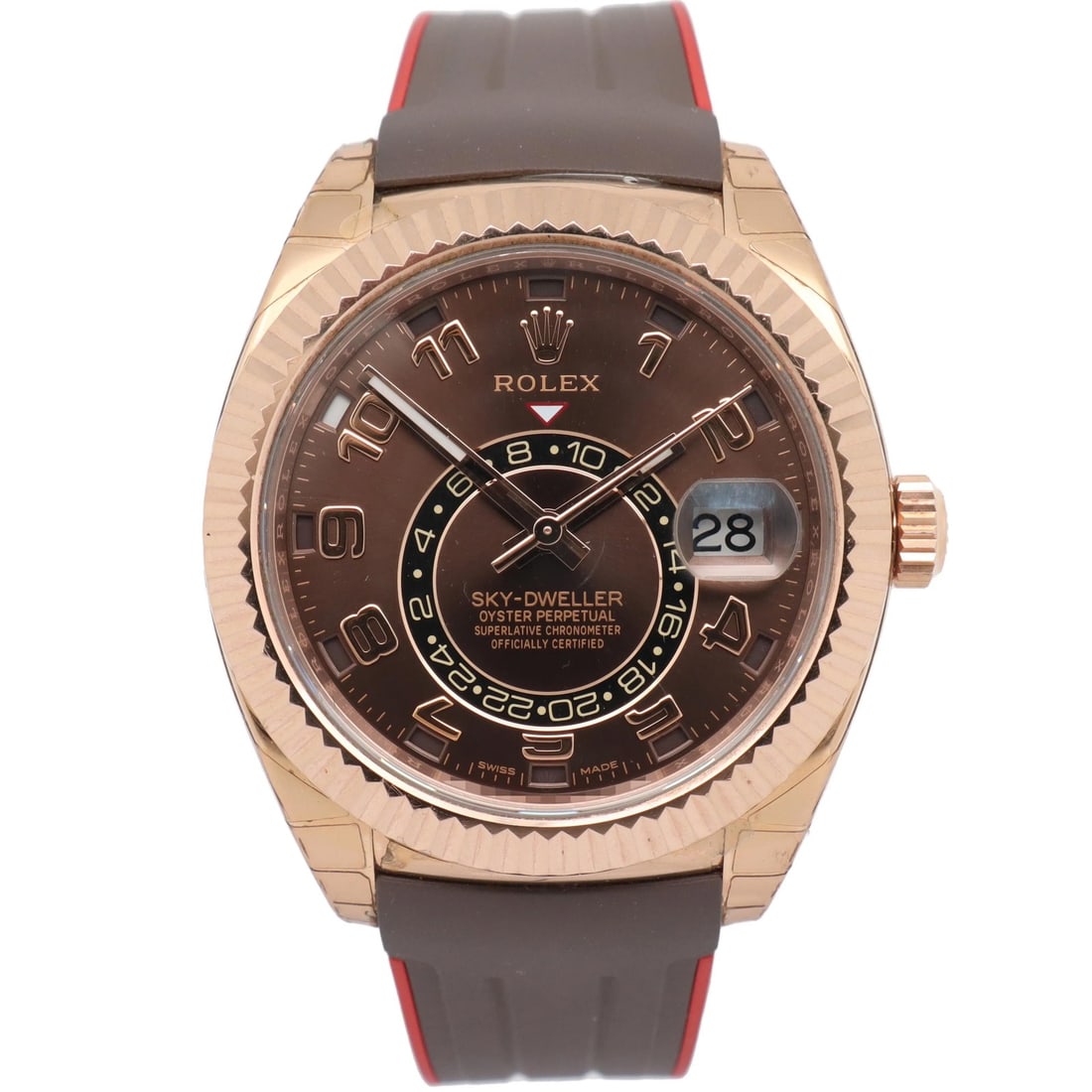 Rolex Sky-Dweller 326135 42mm Rose Gold Chocolate Dial Rubber Strap: Rolex Sky-Dweller 326135 42mm Rose Gold Chocolate Dial Rubber Strap This pre-owned Rolex Sky-Dweller 326135 is a luxury men's wristwatch featuring a 42mm polished 18K rose gold case with a chocolate A