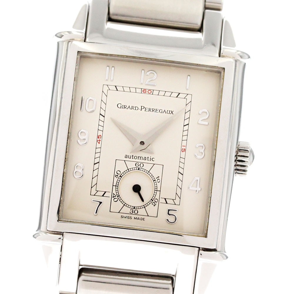 Girard Perregaux Vintage 2594 Automatic Steel Men's Wristwatch: Girard Perregaux Vintage 2594 Automatic Steel Men's Wristwatch This pre-owned Girard Perregaux 2594 Vintage men's wristwatch features a stainless steel case and bracelet with a beige dial. The watch i