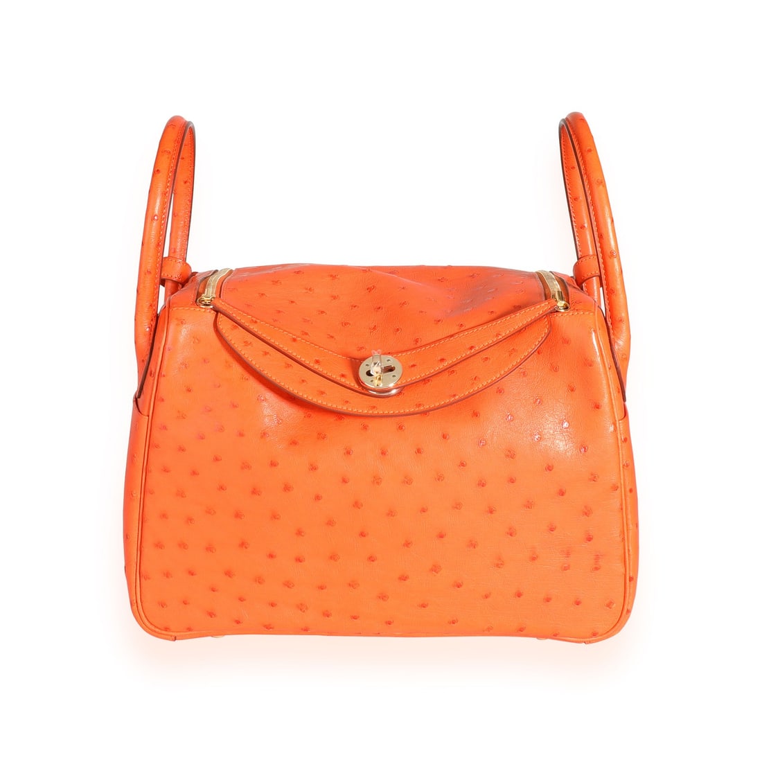 Hermes Lindy 30 Tangerine Ostrich Gold Tone Handbag: Hermes Lindy 30 Tangerine Ostrich Gold Tone Handbag This pre-owned Hermes Lindy 30 handbag is crafted from exotic ostrich leather in a vibrant orange (Tangerine) color. Made in France, it features a v