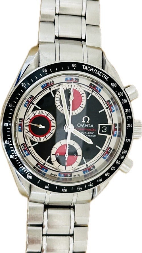 OMEGA Speedmaster Date 3210.52 Automatic Stainless Steel Men's Wristwatch: OMEGA Speedmaster Date 3210.52 Automatic Stainless Steel Men's Wristwatch This OMEGA Speedmaster Date 3210.52 is a men's automatic wristwatch crafted in Switzerland. The watch features a stainless ste