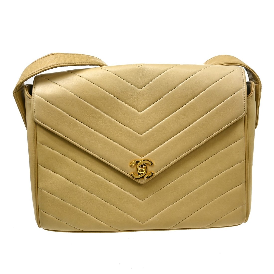 CHANEL Beige Lambskin Chevron Leather Shoulder Bag: CHANEL Beige Lambskin Chevron Leather Shoulder Bag This Chanel shoulder bag features luxurious beige lambskin leather with a chevron pattern, offering a sophisticated and timeless look. Designed in a 