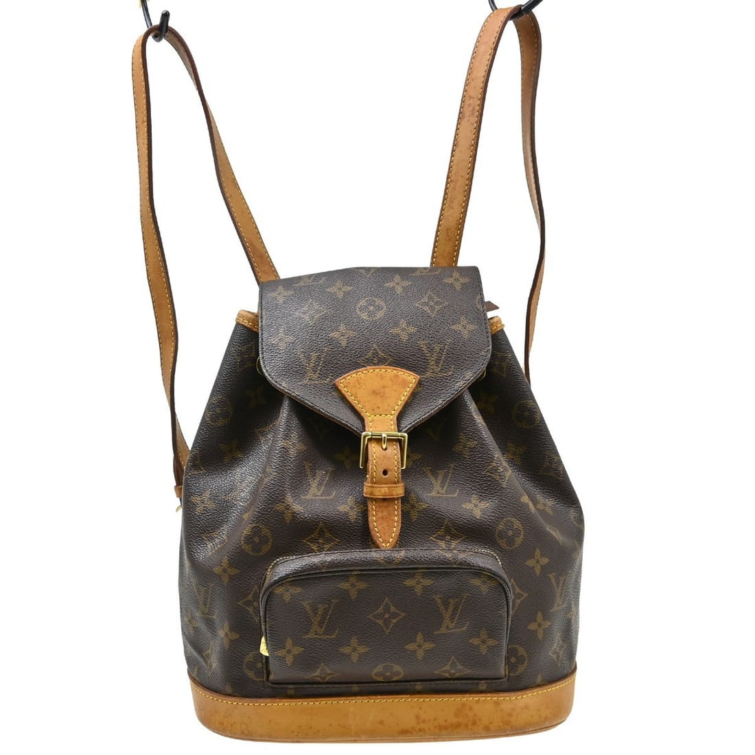 Louis Vuitton Montsouris MM Monogram Canvas Backpack: Louis Vuitton Montsouris MM Monogram Canvas Backpack This Louis Vuitton Montsouris MM backpack features the iconic Monogram canvas leather exterior with a brown finish and beige adjustable shoulder st
